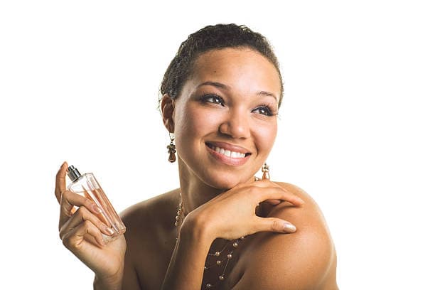 girl holding perfume